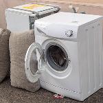 Dumped washing machine. We accept these in our skip waste